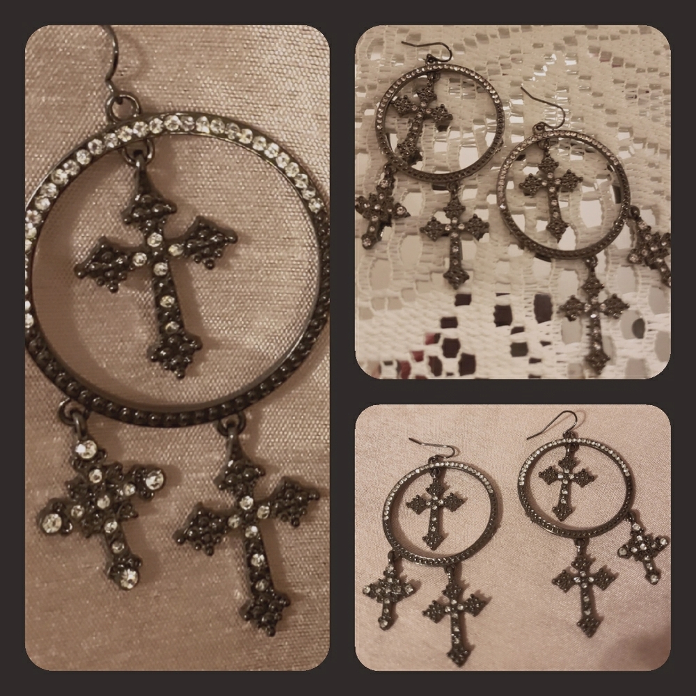 Dark metal earrings with cross decorative accents